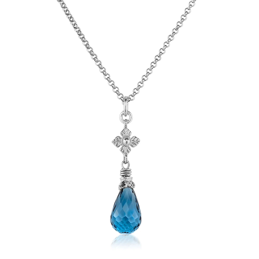 london blue topaz necklace with flower detail in silver