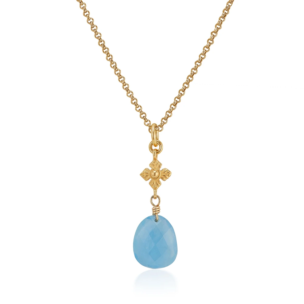 faceted aquamarine necklace with flower detail in gold