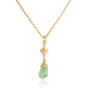 faceted green amethyst twist necklace with flower detail in gold