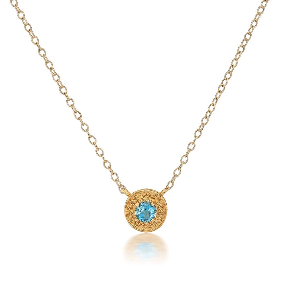 engraved gold disc necklace in blue topaz