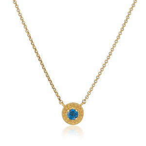 engraved gold disc necklace in london blue topaz