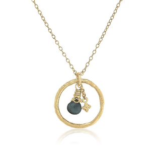 hammered gold circle necklace with moss aquamarine briolette